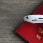 Closeup image of toy plane and passport.