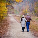 couple elderly walking fall trail 6653517