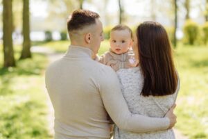 Family Enjoying Walk In Park