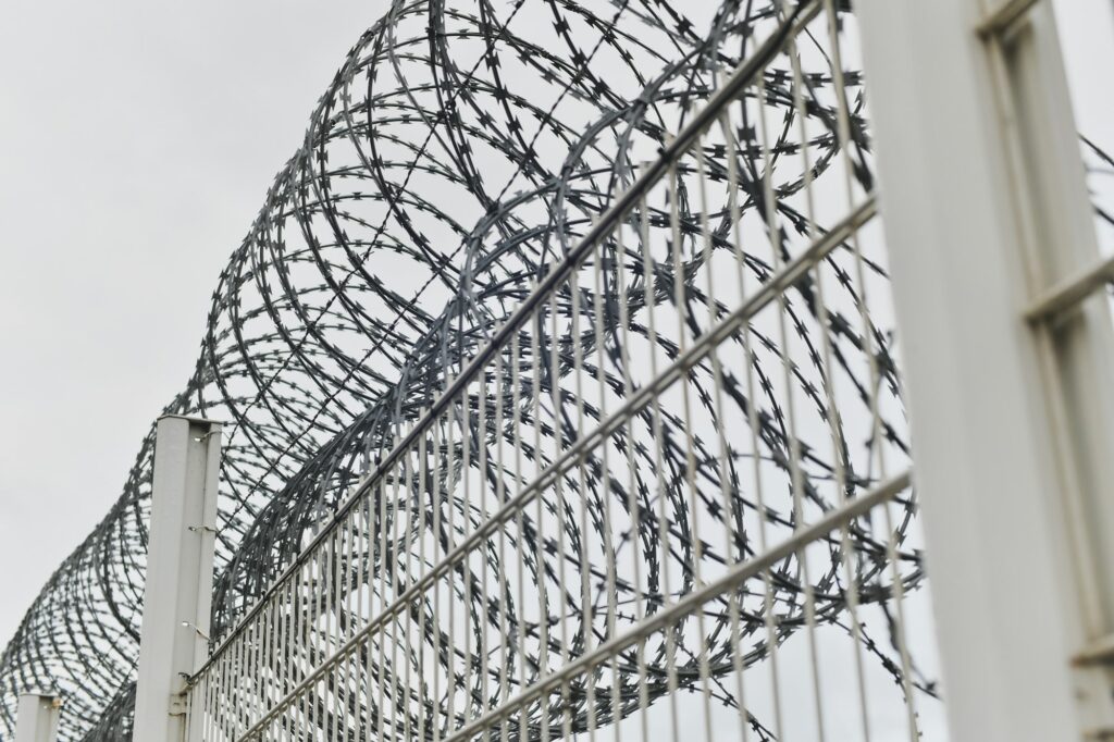 Fence with barbed wire at customs in europe