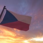 Czech Republic Flag on Flagpole by Evening Sunset Sky