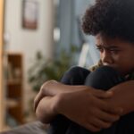 Scared Child Crying Hiding in Room