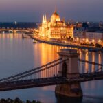 The Hungarian Parliament building and chain bridge in Budapest, in the evening