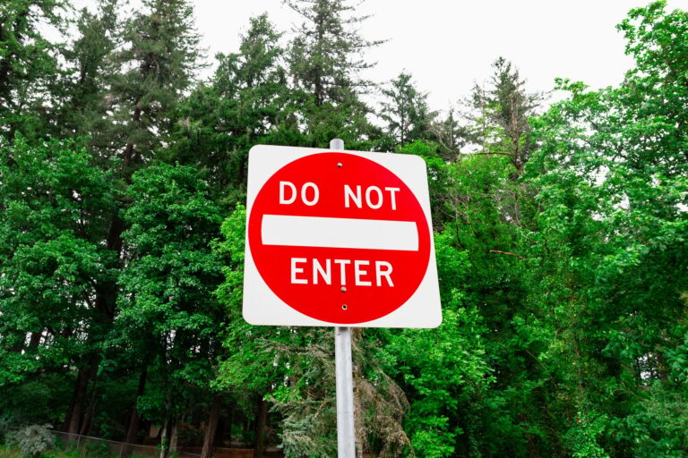 Do Not Enter Sign Restriction Amidst Forest Area